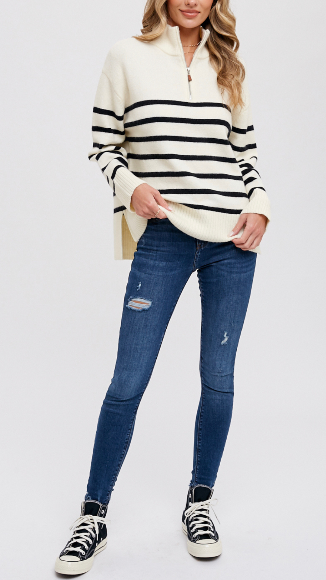 STRIPED QUARTER ZIP SWEATER